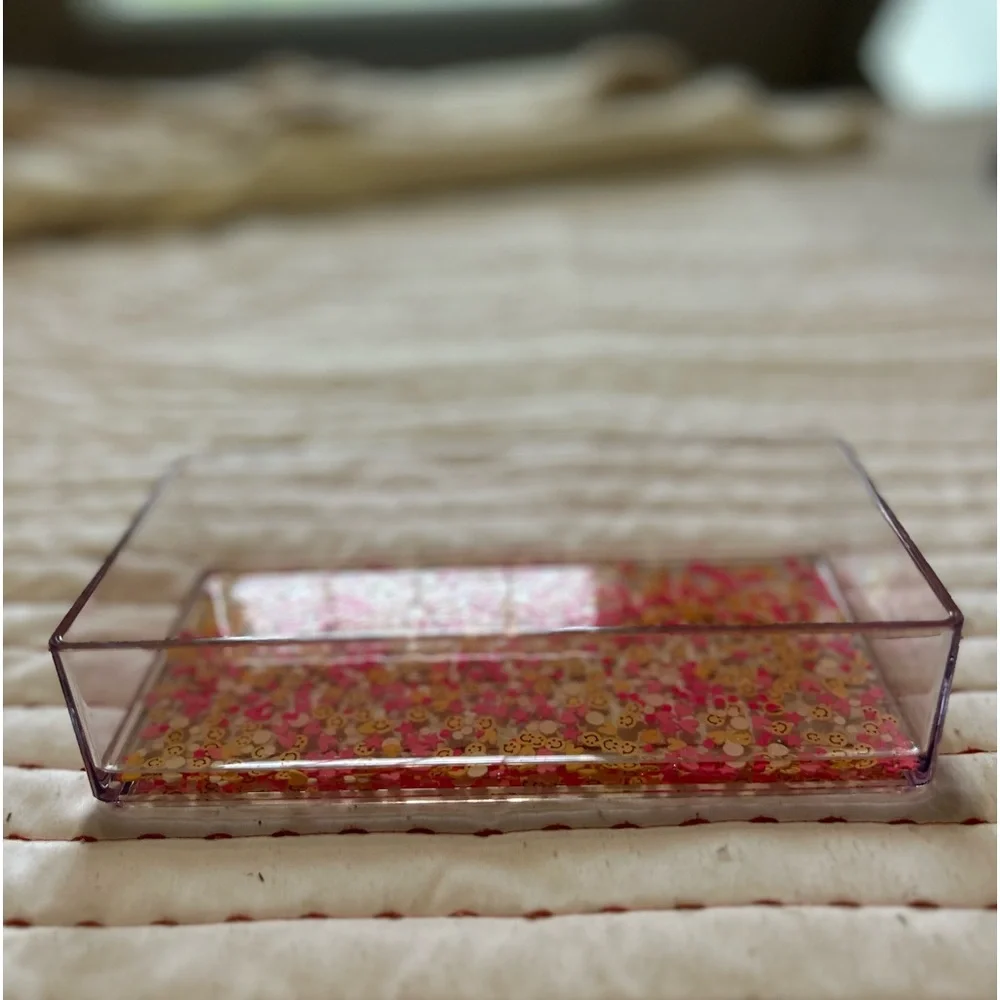 Acrylic tray from Etsy. Pink and orange detailing.